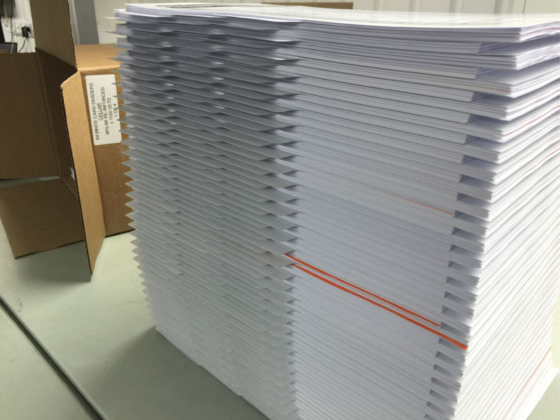 A stack of digital printed brochures